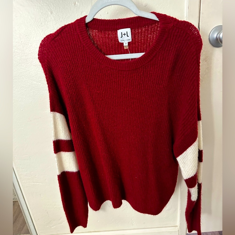 Red and white sweater. Size S